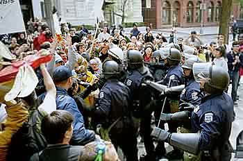riot police clash with protesters