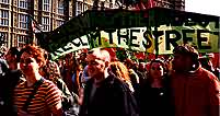 reclaim the streets march past parliament