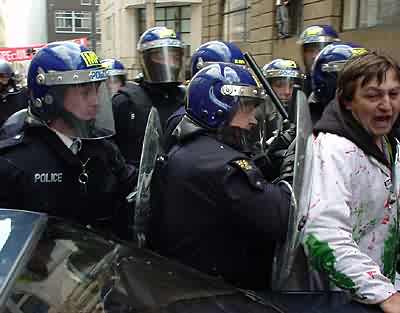 the riot police start attacking bystanders